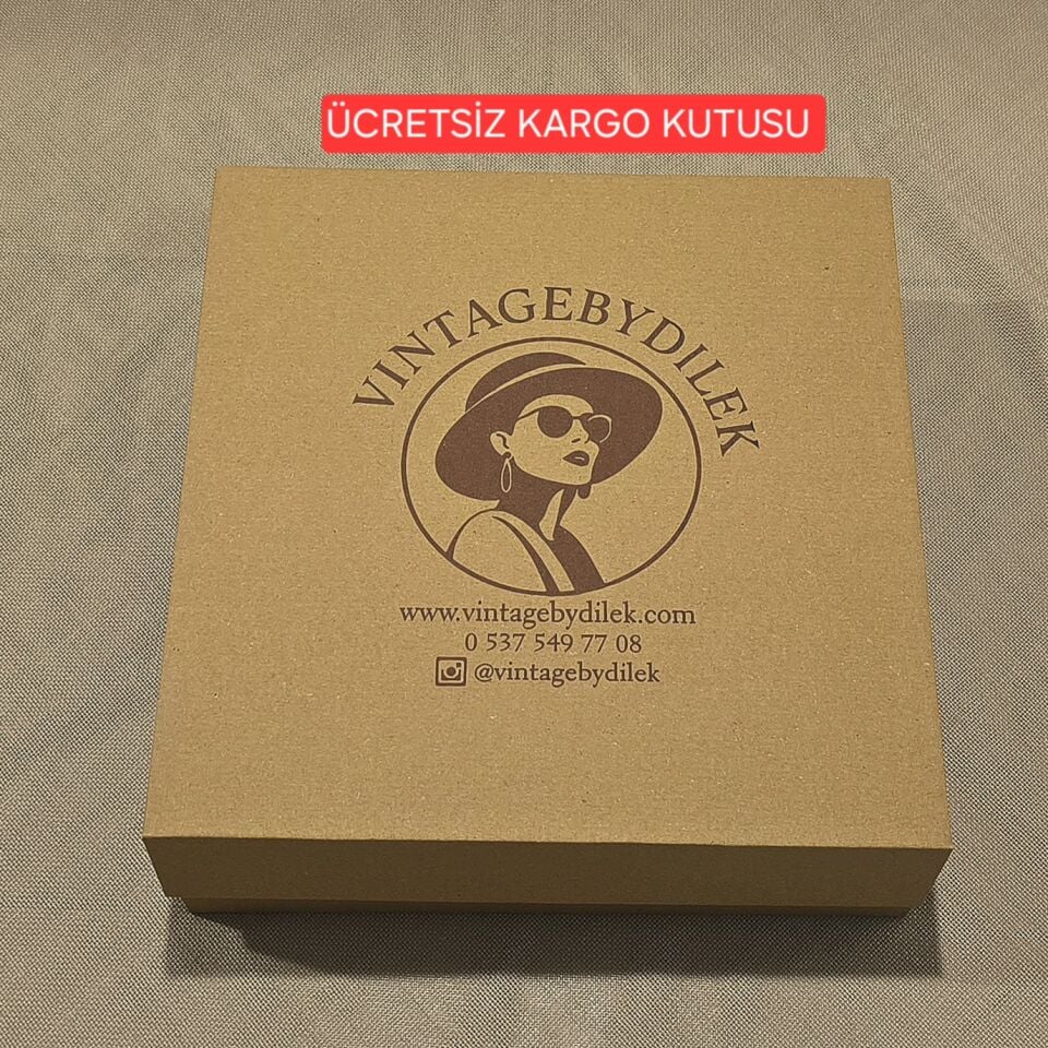 Nomi Kahverengi Şapka